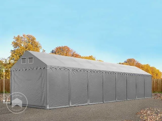 Carpa almacén 4×16 m – altura lateral 2,6m, PVC 800, con base reforzada, gris, con Estática (para suelos blandos)