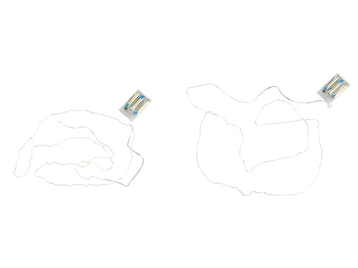 Conjunto de 2 guirnaldas luminosas de plástico blanco y dorado de 8.5×7.5×2.2 cm