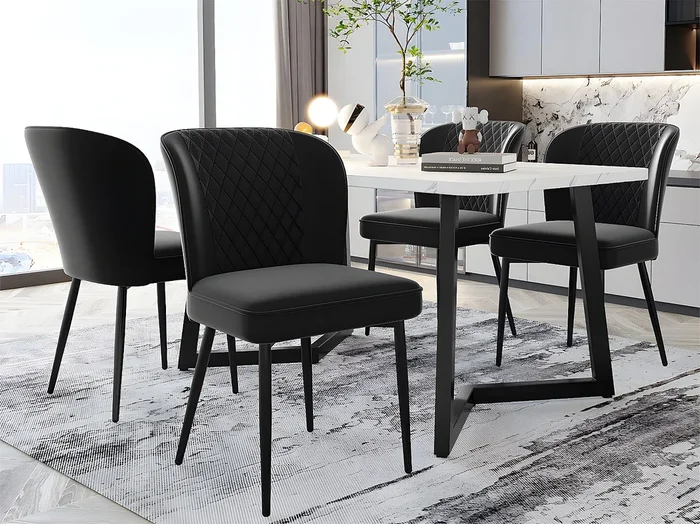 Conjunto de 4 sillas tapizadas en terciopelo – estructura de metal – Negro