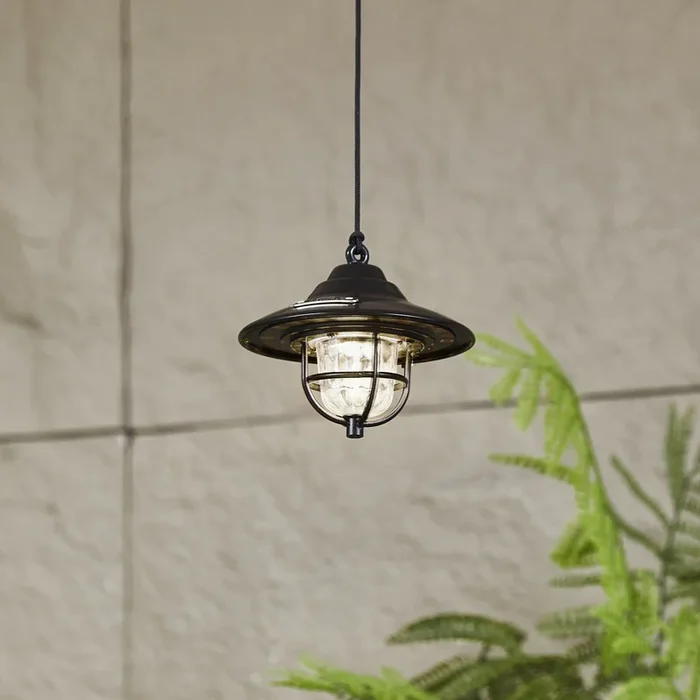 Lámpara exterior LED Lindby Ketil, negra, pica de tierra, batería